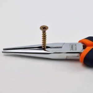 High-quality image of long nose pliers gripping a metal screw on a neutral background.